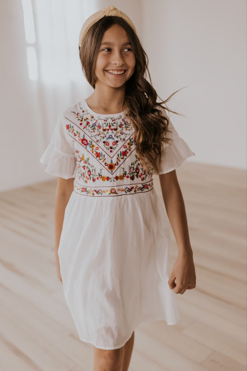white embroidered dress